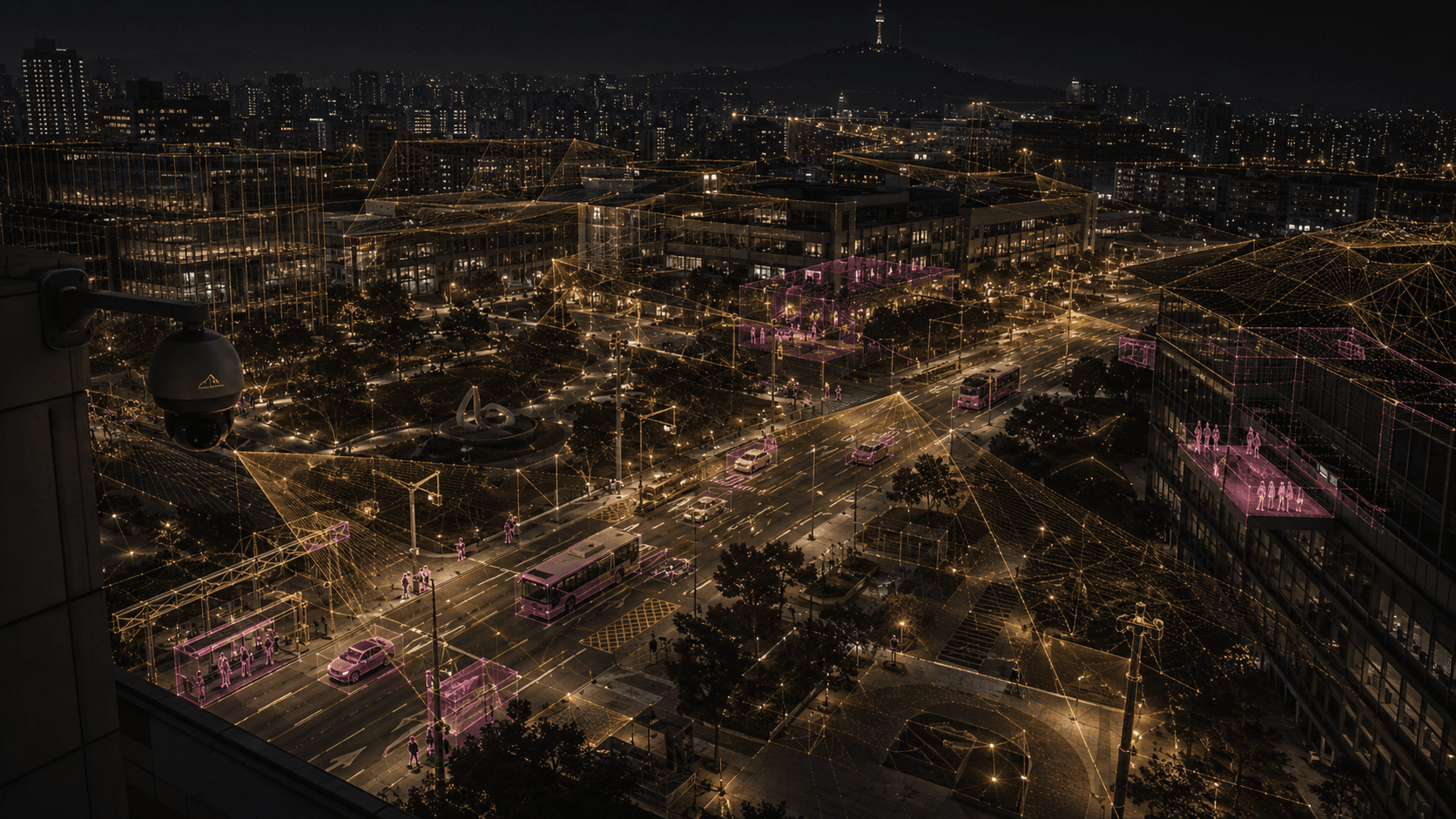 City street at night with a spatial overlay tracking vehicles and roadside structure.